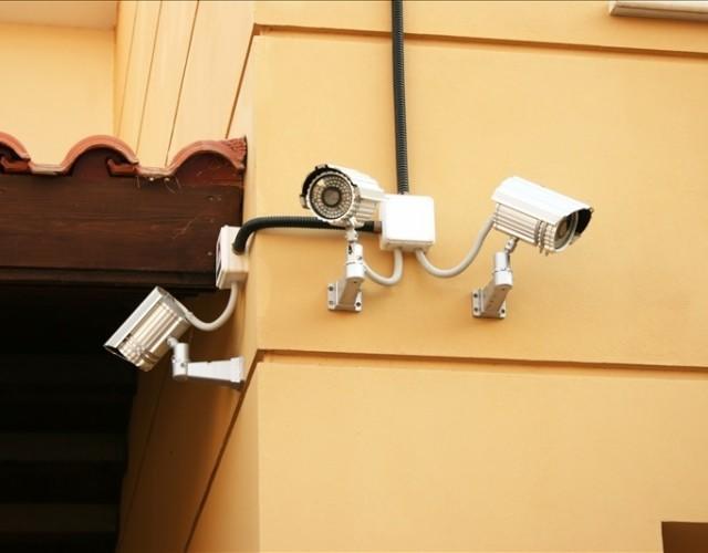 Wall-mounted external security cameras